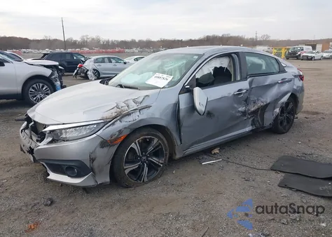 2017 Honda Civic Touring из США, поврежденный, VIN 2HGFC1F95HH638797